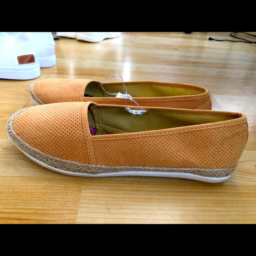 NWT yellow ( orangish yellow) flat espadrilles.